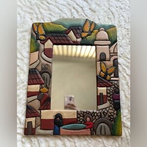 Artistic Village Scene Wall Mirror with Butterfly Accents